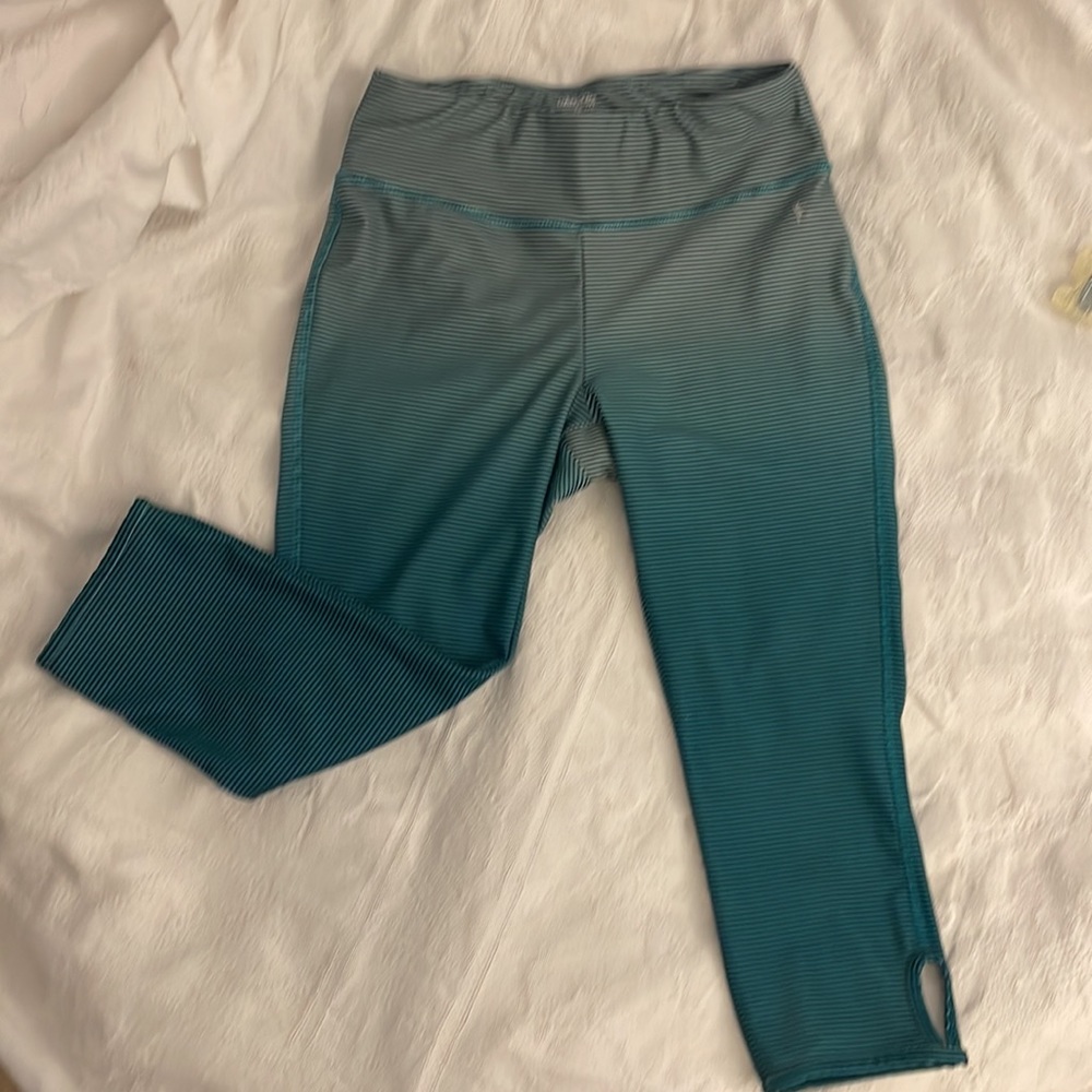 DANSKIN now workout calf length bottoms.  Turquoise and gray stripes. Size S